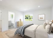 Thumbnail 5 of 32 - a white bedroom with a bed and a bathroom