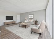 Thumbnail 5 of 36 - A modern living room with a grey sofa, a wooden coffee table, and a TV on the wall.