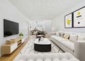 Thumbnail 6 of 41 - A modern living room with a white couch, a black coffee table, and a flat-screen TV mounted on the wall.
