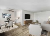 Thumbnail 8 of 70 - a living room and dining room with white furniture and a tv