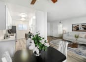 Thumbnail 9 of 70 - a living room and dining room with a black table