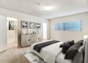 Thumbnail 12 of 70 - a bedroom with a bed and a dresser