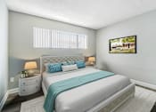 Thumbnail 25 of 50 - the master bedroom has a king size bed and a window