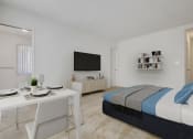 Thumbnail 2 of 24 - a bedroom with a bed and a desk and a television