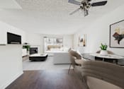 Thumbnail 5 of 35 - A modern living room with a white sofa and a glass coffee table.