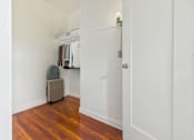 Thumbnail 24 of 61 - A white door with a silver handle is on the right side of the image.