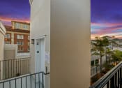 Thumbnail 17 of 66 - the view from the balcony of a condo building at sunset