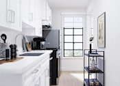 Thumbnail 15 of 25 - Spacious kitchen with modern appliances and abundant natural light.