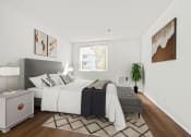 Thumbnail 4 of 95 - a bedroom with a large bed and a window