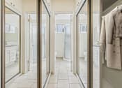 Thumbnail 14 of 61 - A bathroom with a white towel hanging on the wall.