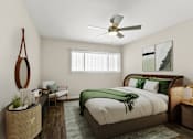 Thumbnail 8 of 18 - a bedroom with a bed and a ceiling fan