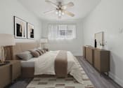 Thumbnail 20 of 30 - A bedroom with a bed, nightstand, and a ceiling fan.