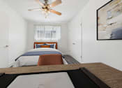 Thumbnail 19 of 30 - A bedroom with a bed, a ceiling fan, and a painting on the wall.