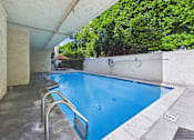Thumbnail 101 of 108 - A small pool with a metal ladder.