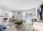 Thumbnail 15 of 95 - a living room with white furniture and a ceiling fan