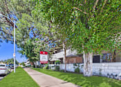 Thumbnail 33 of 36 - A street view of a residential area with a sign for Valley Terrace.