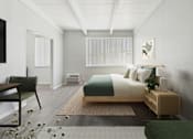 Thumbnail 6 of 16 - A bedroom with a bed, nightstand, and chair.