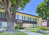 Thumbnail 50 of 55 - A building with the number 7055 on it.