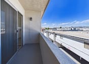 Thumbnail 7 of 61 - A balcony with a view of the cityscape.