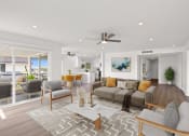 Thumbnail 7 of 135 - a living room with a couch and a table