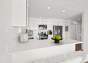 Thumbnail 3 of 135 - a white kitchen with a bowl of fruit on the counter