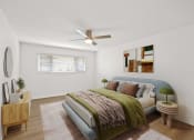 Thumbnail 16 of 135 - a bedroom with a bed and a ceiling fan