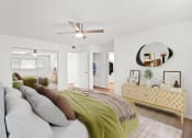 Thumbnail 15 of 135 - a bedroom with a large bed and a ceiling fan