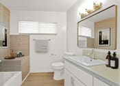 Thumbnail 20 of 135 - a bathroom with a sink toilet and a mirror