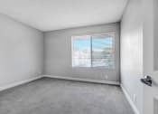 Thumbnail 37 of 64 - the living room of an empty house with a window