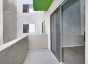 Thumbnail 22 of 61 - a large white room with a glass door and a balcony
