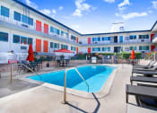 Thumbnail 11 of 52 - our apartments have a pool and lounge chairs in the courtyard