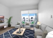 Thumbnail 18 of 83 - a living room with a couch and a coffee table and a balcony