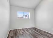 Thumbnail 57 of 62 - the living room of our studio apartment atrium with wood flooring and a window