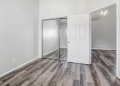 Thumbnail 31 of 62 - the living room of our studio apartment atrium with a door to the closet