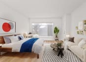 Thumbnail 6 of 17 - a living room with a bed and a couch