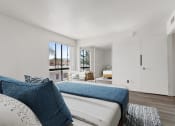 Thumbnail 16 of 20 - the master bedroom has a large bed and a large window