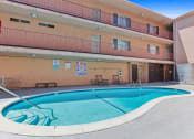 Thumbnail 19 of 20 - a resort style swimming pool in the middle of a building