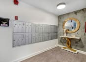 Thumbnail 15 of 16 - a locker room with lockers and a mirror
