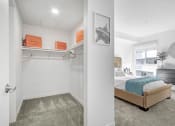 Thumbnail 8 of 83 - a bedroom with a bed and a closet