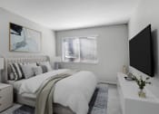 Thumbnail 13 of 61 - a white bedroom with a large bed and a tv