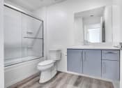 Thumbnail 10 of 42 - a bathroom with a sink toilet and a shower