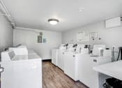 Thumbnail 25 of 102 - the laundry room is equipped with washes and dryers