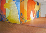 Thumbnail 10 of 10 - an empty room with a mural and a bench