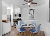Thumbnail 11 of 64 - our modern kitchen and dining room with a table and chairs