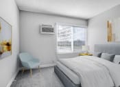 Thumbnail 16 of 64 - a bedroom with a bed and a chair and a window
