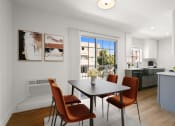Thumbnail 13 of 32 - a dining room with a table and chairs and a kitchen