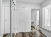 Thumbnail 6 of 73 - a living room with white walls and a sliding glass door