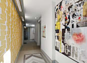Thumbnail 20 of 24 - a hallway with paintings on the wall and a corridor with a door