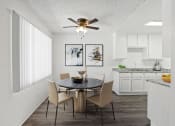 Thumbnail 2 of 8 - our apartments offer a dining room and kitchen with a ceiling fan