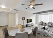 Thumbnail 16 of 40 - a living room with a white table and chairs and a ceiling fan